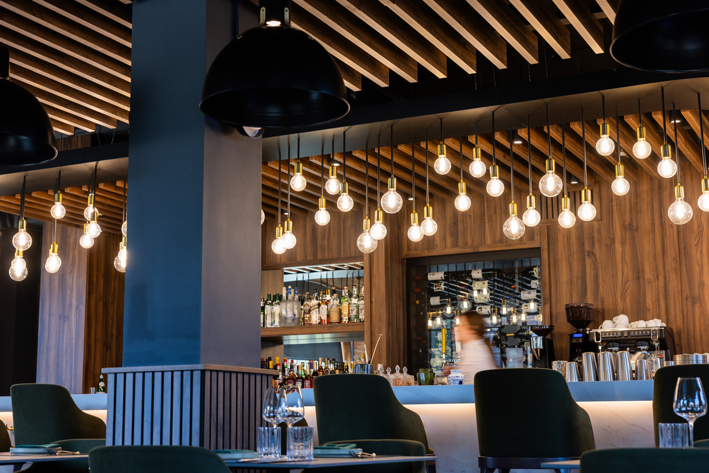Restaurant dining room under pendant lights